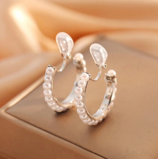 Clip on 1 1/4" silver and white pearl hoop earrings