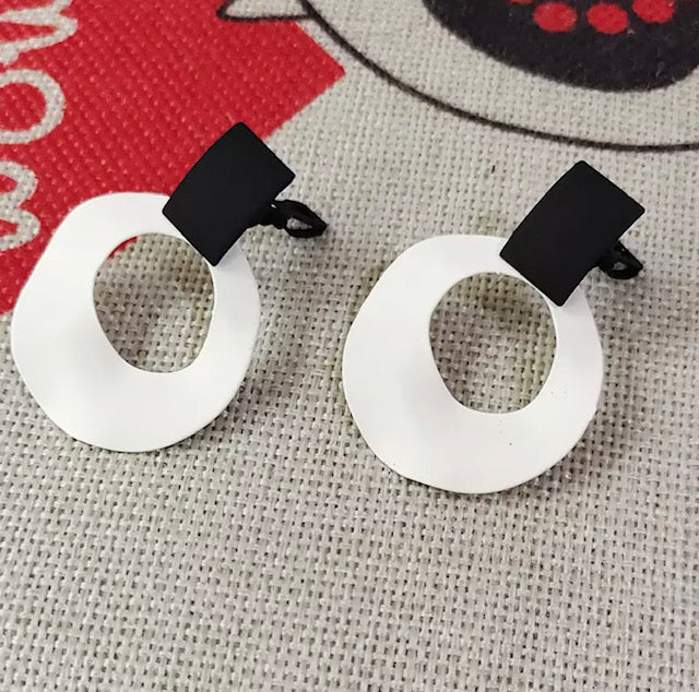 Clip on 2" black off white and black wavy hoop earrings
