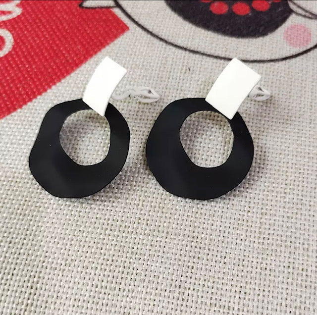 Clip on 2" black off white and black wavy hoop earrings