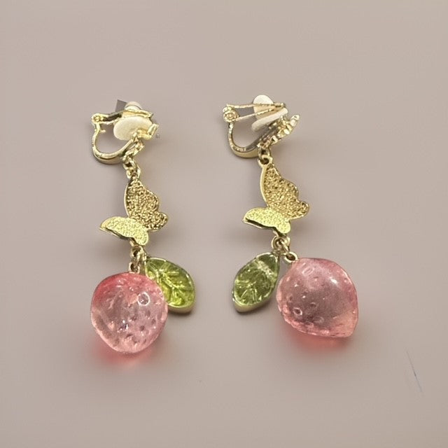 Clip on 2 1/4" gold butterfly earrings with red strawberry and green leaf