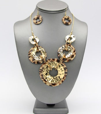 Pierced gold chain necklace set with brown stone and gold beads