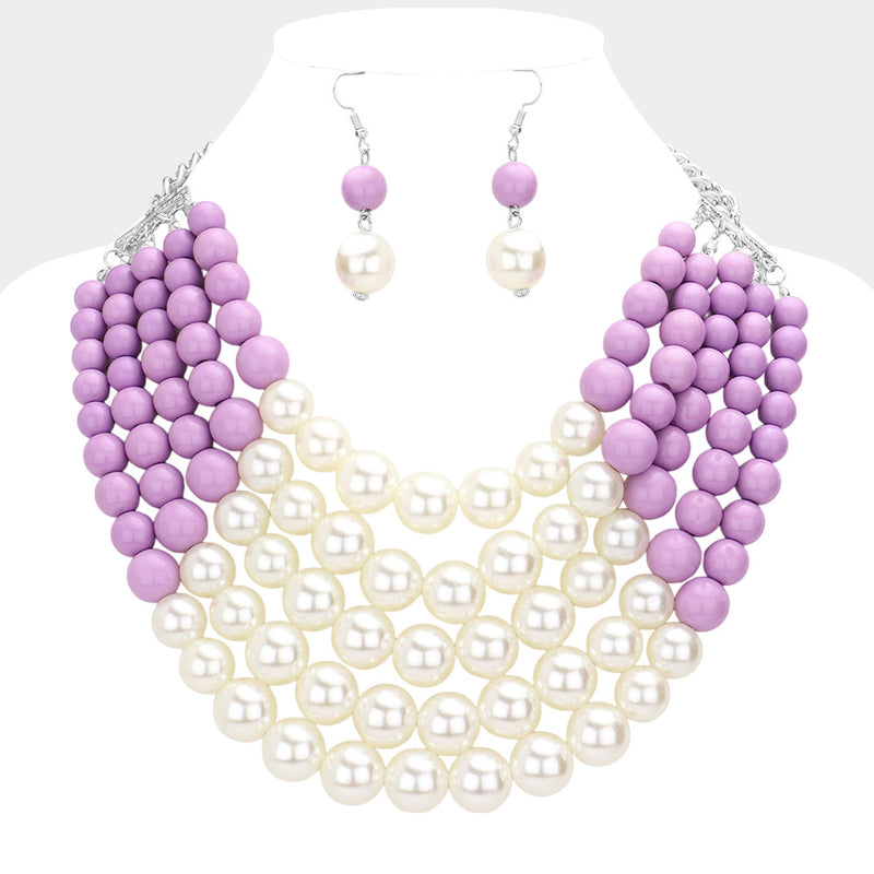 Pierced multi strand gold, light purple, and cream pearl necklace set