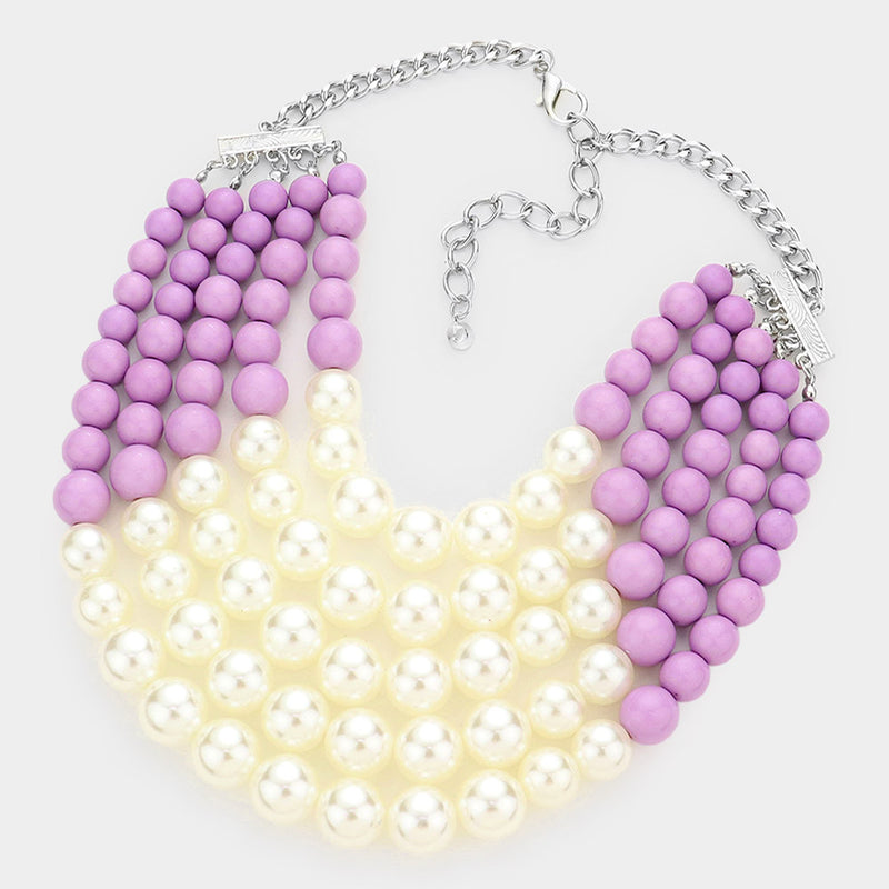 Pierced multi strand gold, light purple, and cream pearl necklace set
