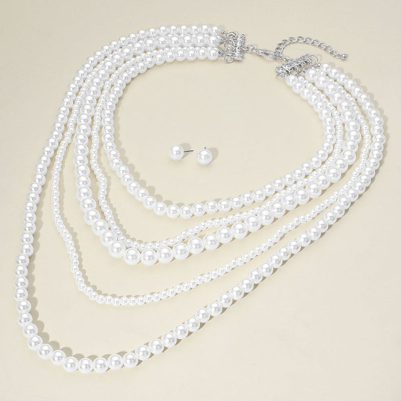 Pierced silver & white multi strand white pearl necklace and earring set