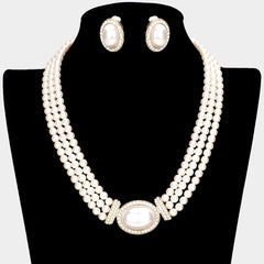 Trendy clip on gold, cream pearl and clear stone necklace and earring set