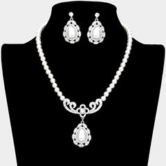 Classy pierced silver, white pearl teardrop necklace and earring set