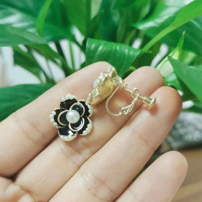Clip on 3/4" flat or screw back clasp gold & black flower & pearl earrings