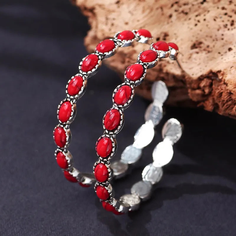 Western pierced 2" silver and red stone hoop earrings