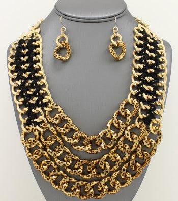 Pierced gold and black animal print wide chain necklace and earring set