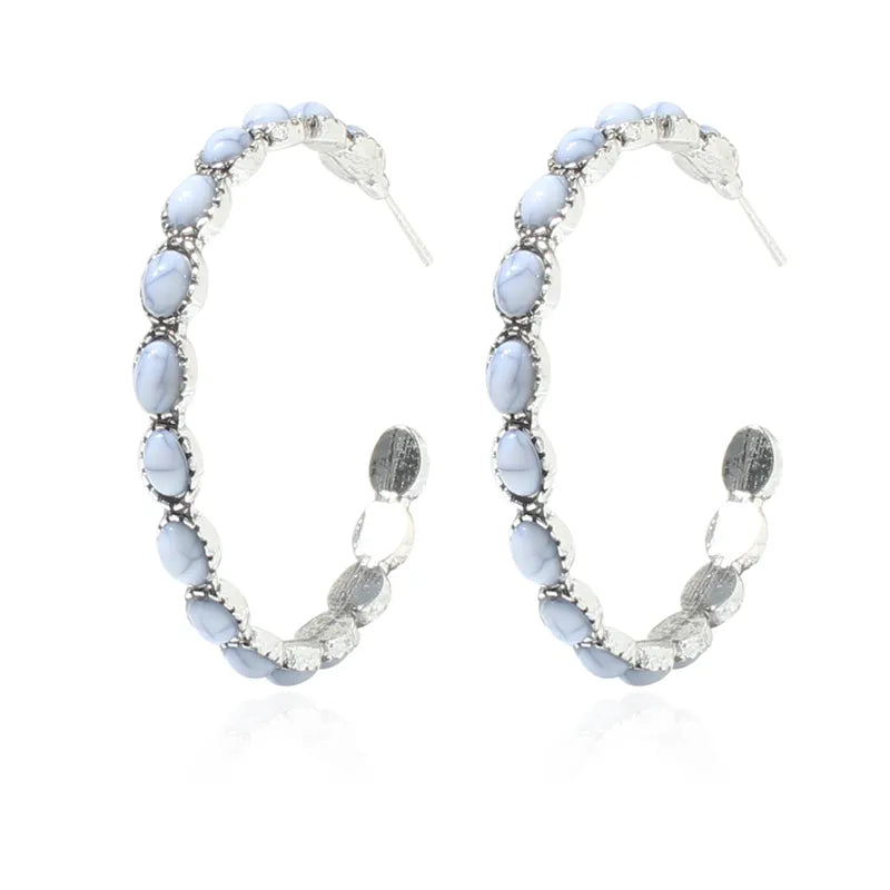 Western pierced 2" silver and white crackle stone hoop earrings
