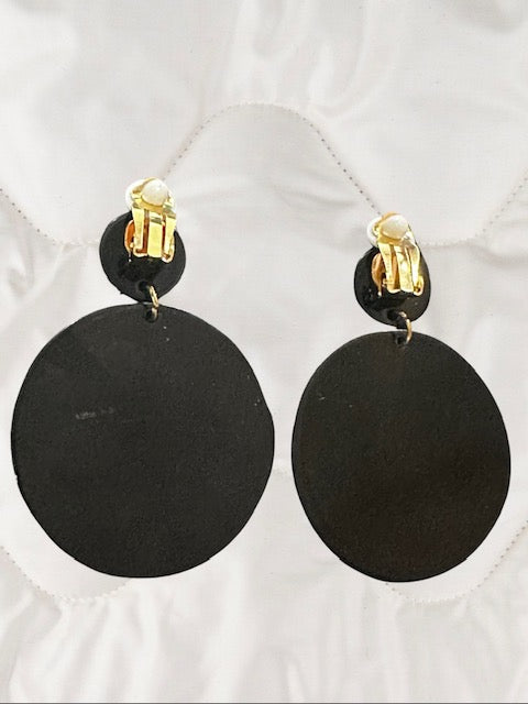 Clip on 2 1/2" gold, black, and white printed dangle double round earrings