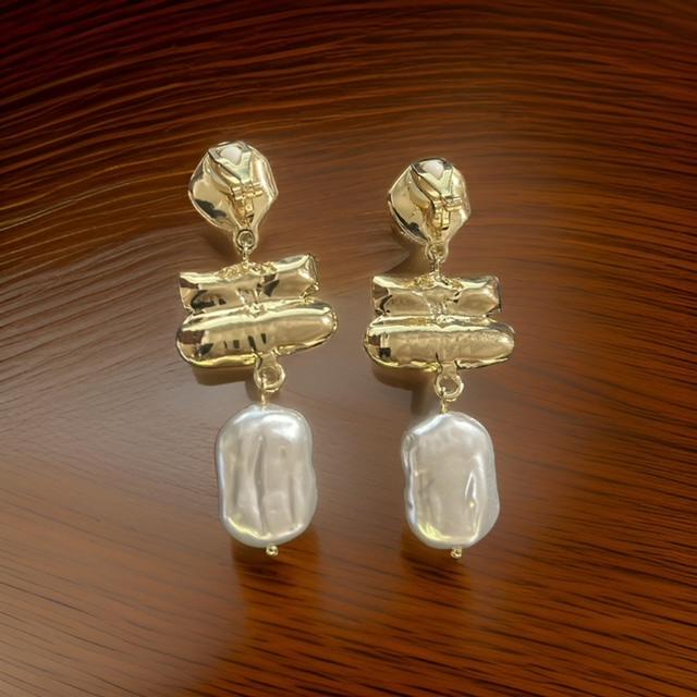 Clip on 2 3/4" gold and white hammered pearl earrings with clear bar stone