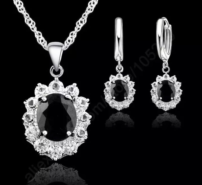 Sterling silver black and clear stone oval pendant necklace set