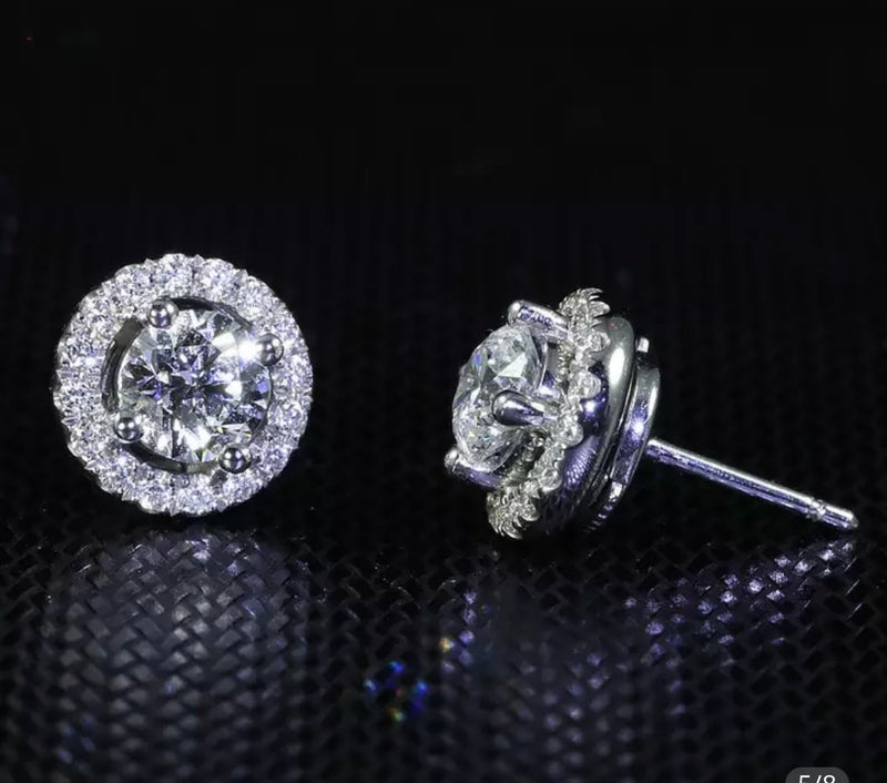 Sterling silver round raised clear stone pierced earrings
