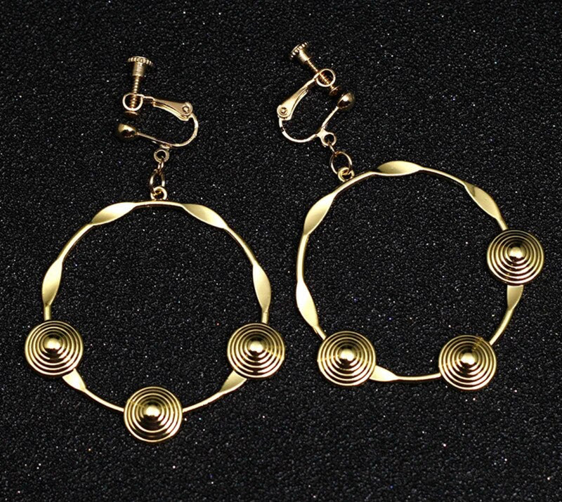 Classy 2 1/4" clip on gold pinched hoop earrings with raised indented circles