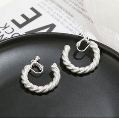 Clip on matte silver twisted open back hoop earrings