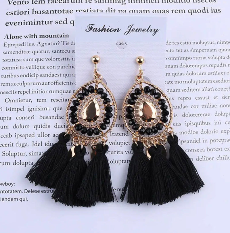 Clip on 3 1/4" gold earrings with beads and tassels in a variety of colors