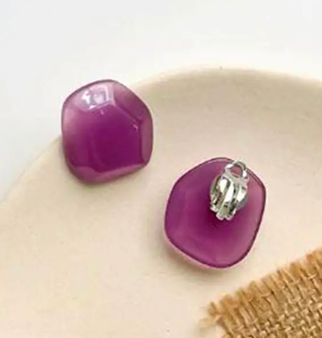 Clip on 1 1/4" silver and purple odd shaped button style earrings
