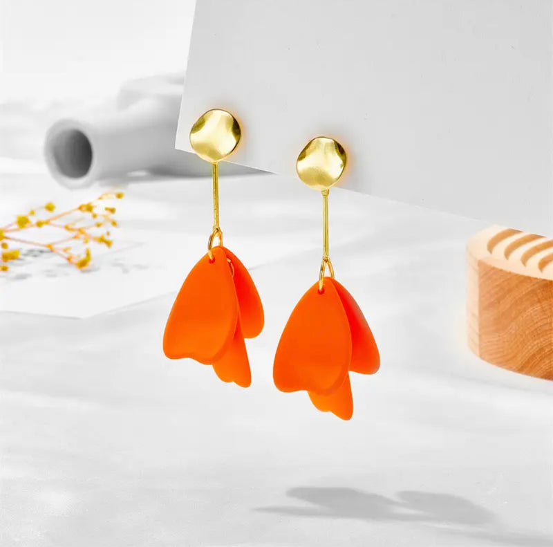 Trendy clip on 3" long gold wire orange petal straight earrings