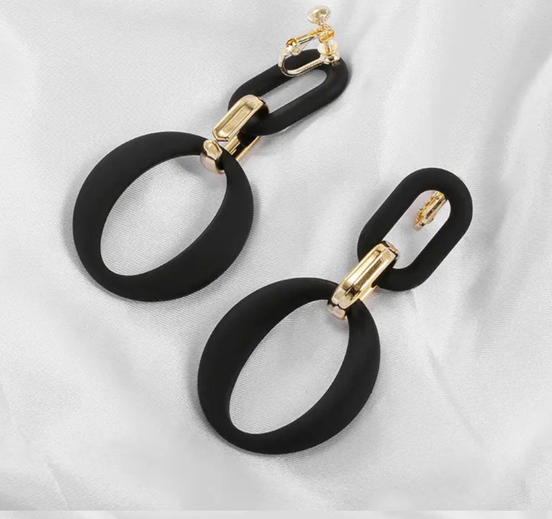 Clip on 2 1/3" vintage gold and black acrylic dangle oval hoop earrings