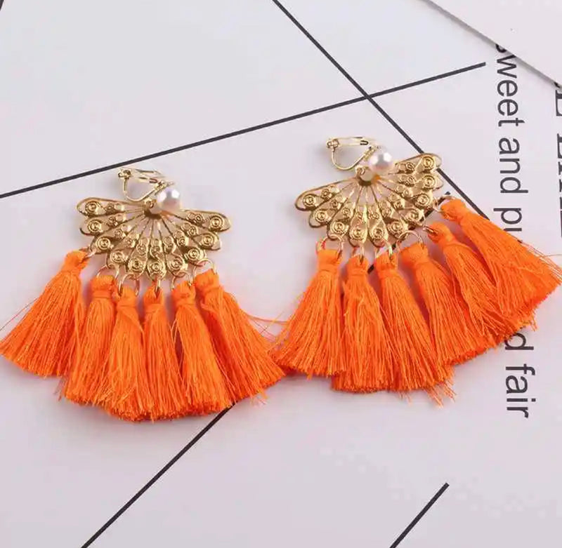 Clip on 2 3/4" gold fan tassel earrings in a variety of colors and top pearl