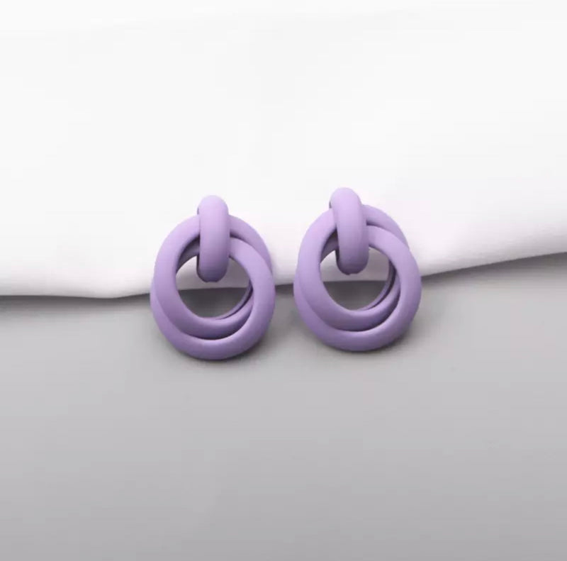 Pierced purple painted loose knot earrings