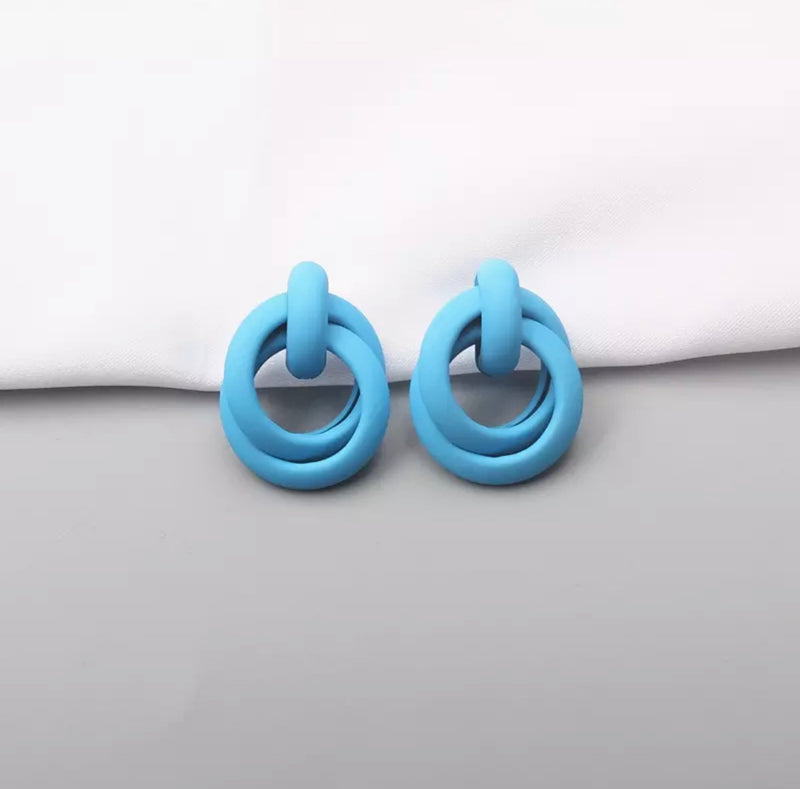 Pierced blue painted loose knot earrings