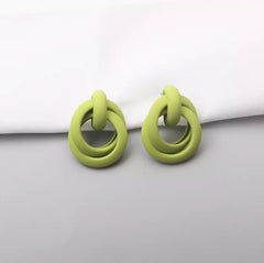 Pierced green painted loose knot earrings