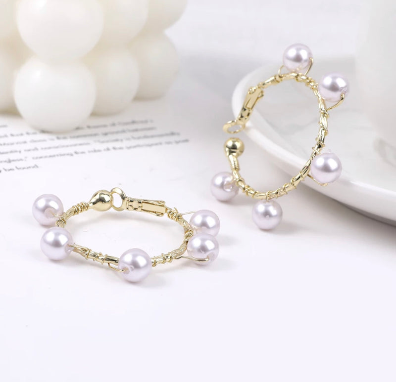 Clip on gold twisted wire white pearl hoop earrings