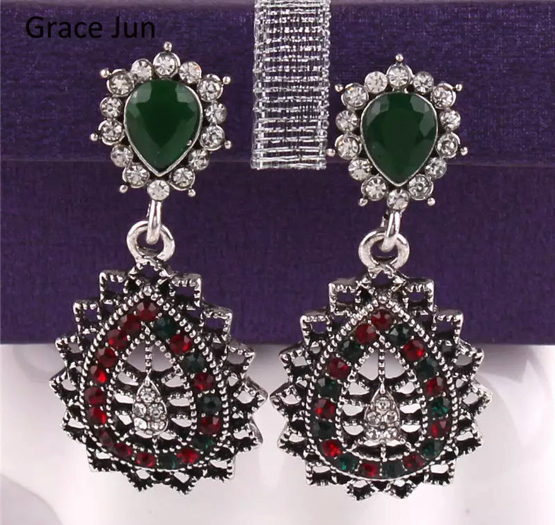 Vintage 2 1/2" clip on silver cutout green and red stone earrings
