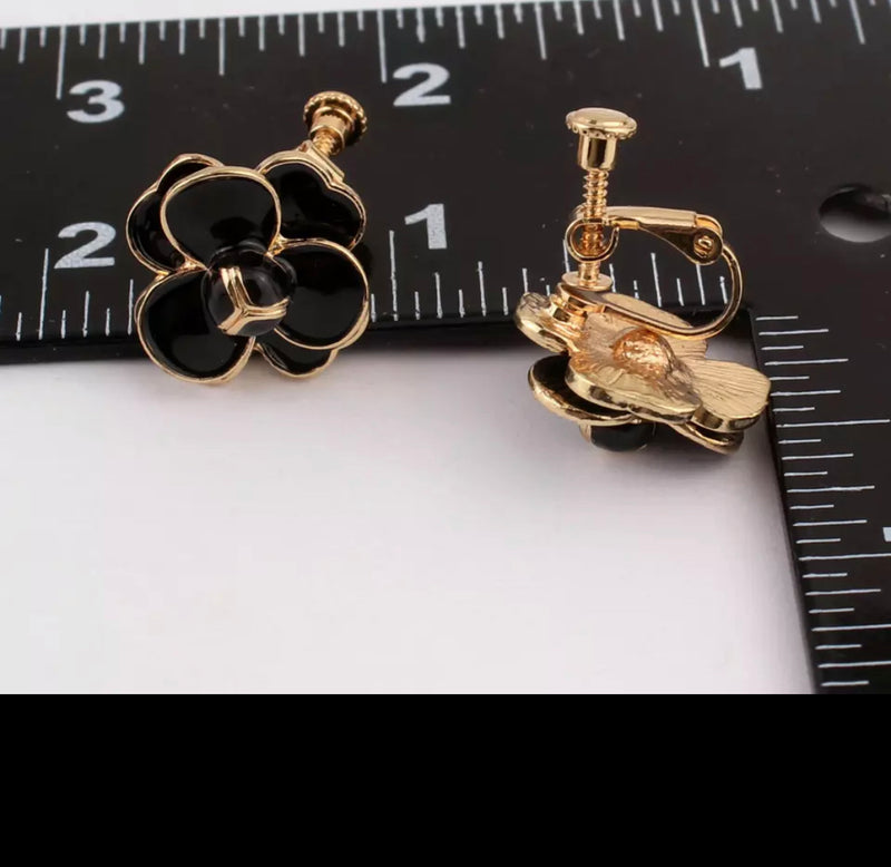 Clip on 3/4" black and gold flower screw back earrings