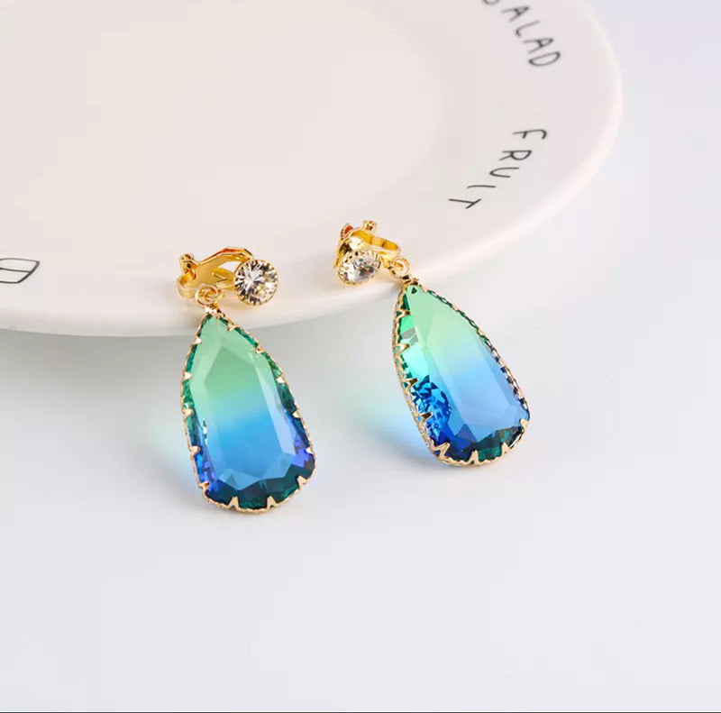 Clip on 1 1/2" gold, blue, and green odd shaped stone earrings