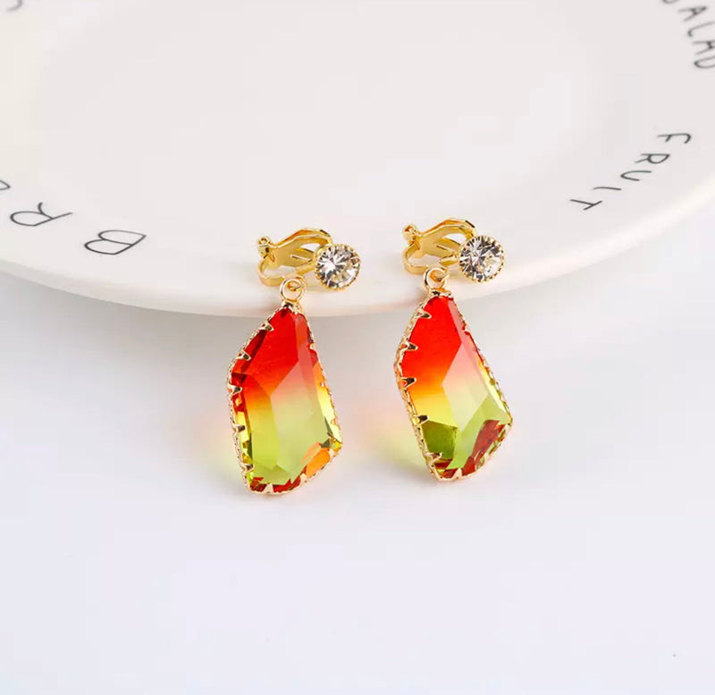 Clip on 1 1/2" gold, orange and yellow odd shaped stone earrings