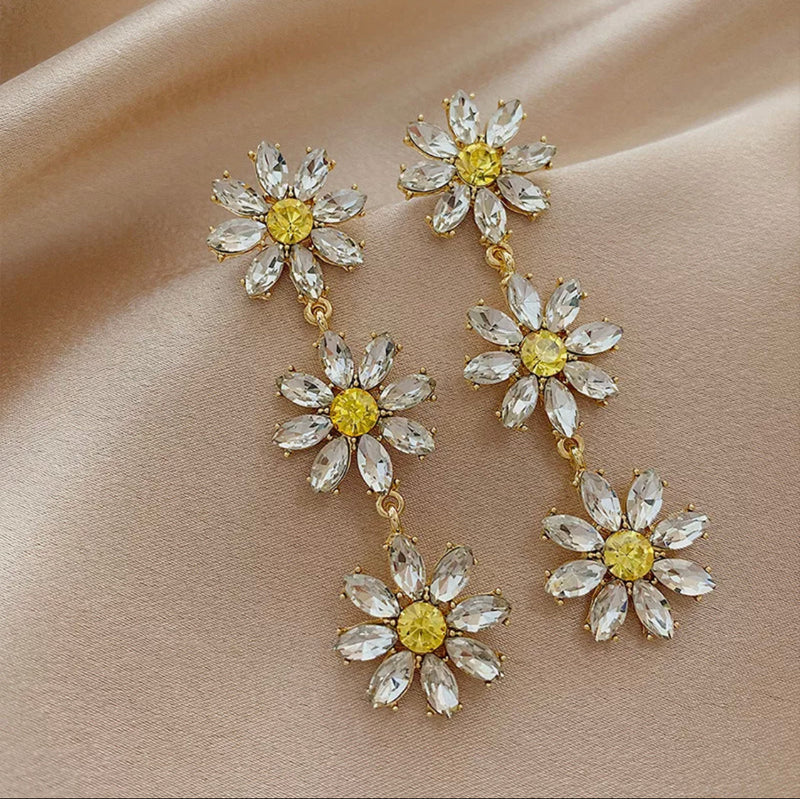 Clip on 3 1/4" gold clear and yellow flower earrings