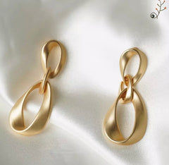 Clip on matte gold twisted link dangle earrings