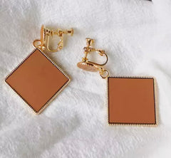 Clip on gold stone dangle square earrings