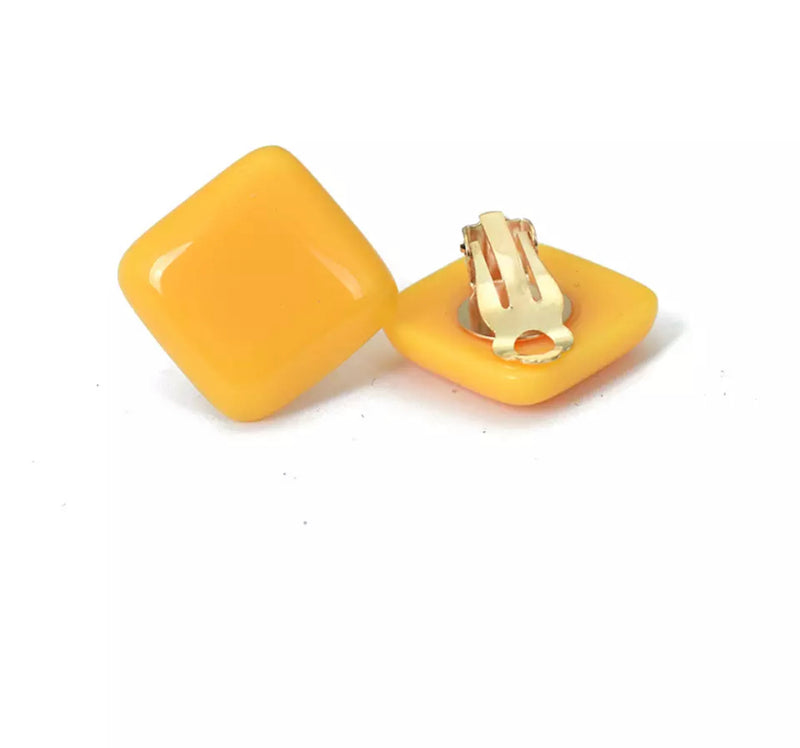 Clip on 1" gold and yellow plastic square earrings