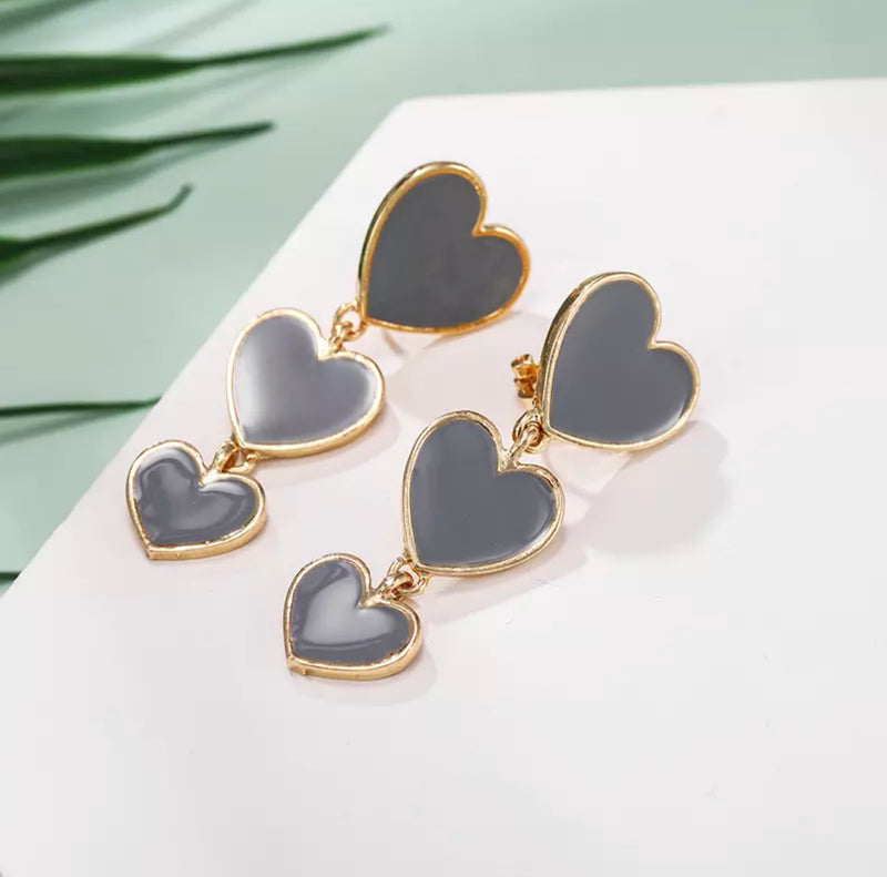 Trendy 2" clip on gold and gray dangle three heart earrings