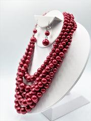 Clip on silver and shiny red five strand pearl necklace set
