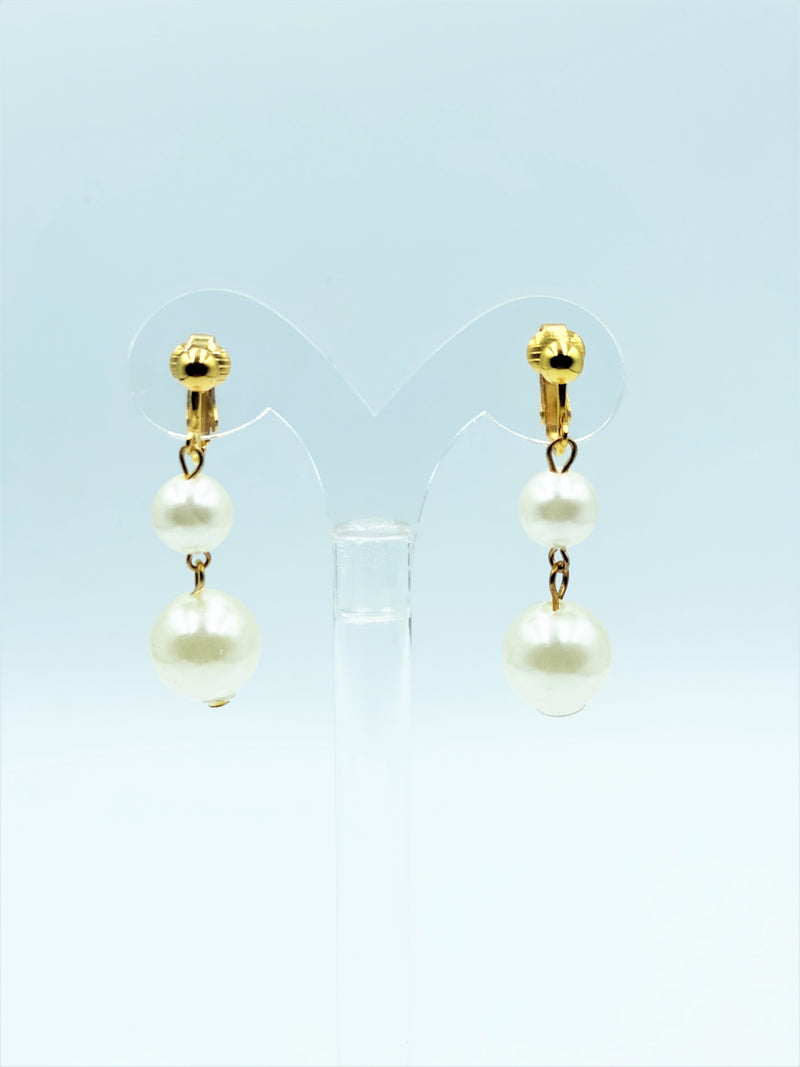 Clip on 2" gold dangle graduated double cream pearl earrings