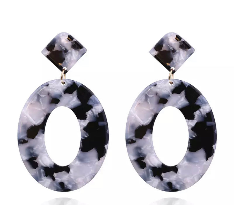 Clip on 2 3/4" plastic white & black oval dangle hoop earrings