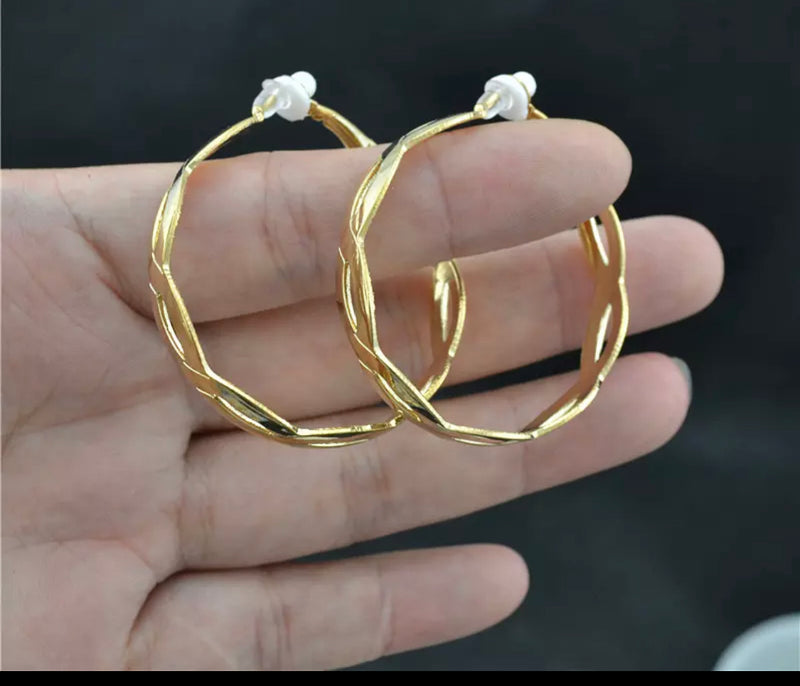 Unique clip on 1 3/4" shiny silver or gold loose twisted hoop earrings