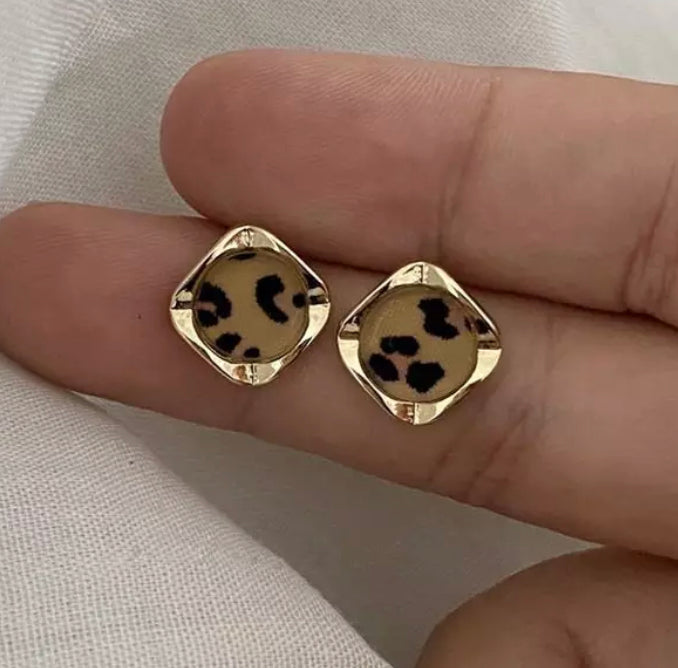 Clip on 1/2" small plastic back gold and brown animal print earrings