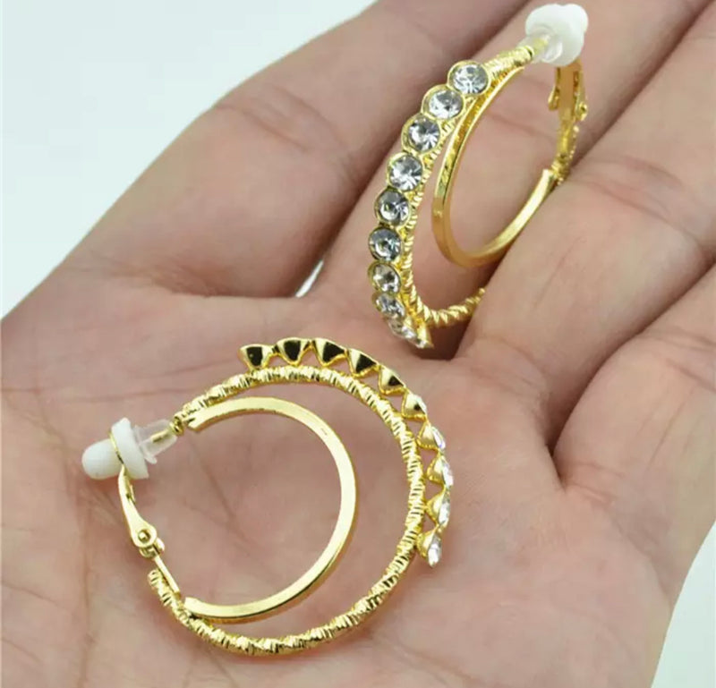 Clip on 1 1/4" gold double hoop earrings with front clear stones