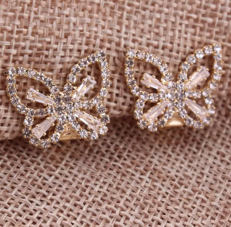 Clip on 3/4" gold and clear stone cutout butterfly earrings