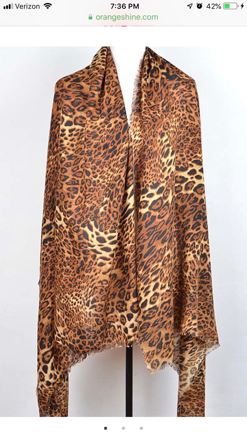 Brown, black and cream animal print 39" X 70" shawl-scarf with frayed edges