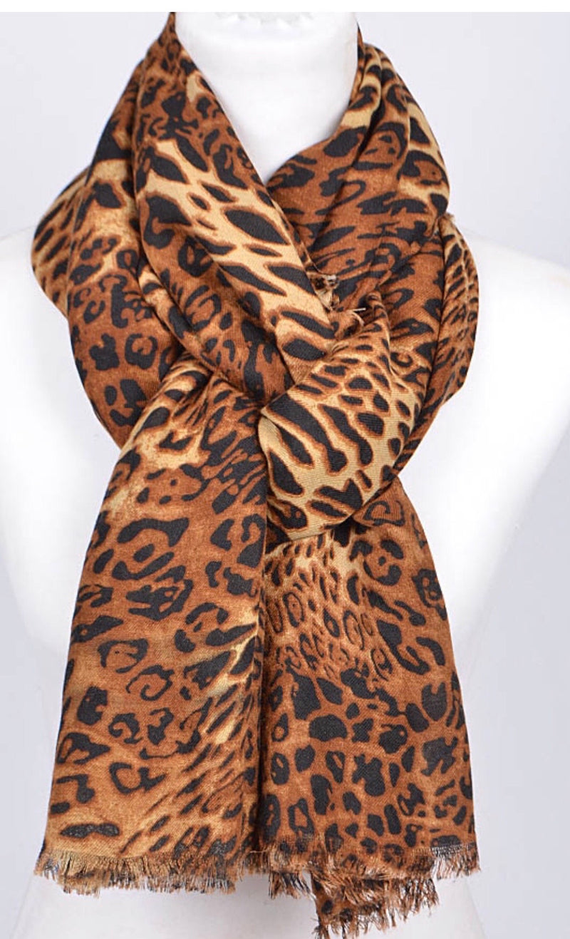 Brown, black and cream animal print 39" X 70" shawl-scarf with frayed edges