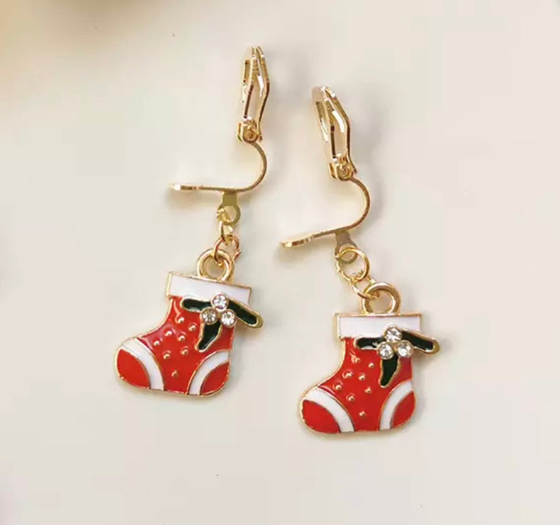 Clip on 1 1/2" gold and red Christmas stocking dangle earrings with clear stone