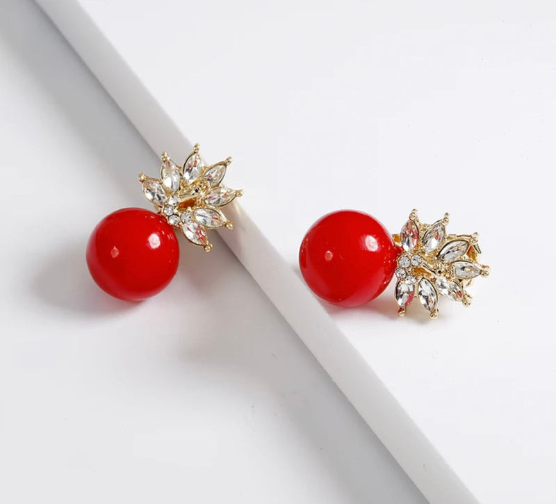 Classy 1" clip on gold clear stone pointed crown red bead earrings