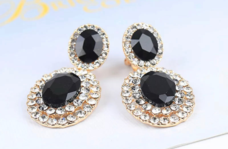 Clip on 1 3/4"gold, clear and black stone double oval dangle earrings